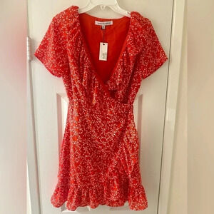 NWT- Cupakes & Cashmire Orange/Coral‎ Print Wrap Flutter Dress. Size XS.